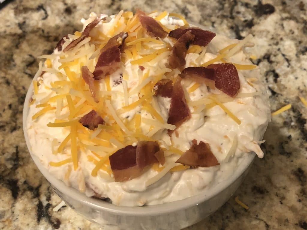 Bacon Ranch Cheddar Dip in a bowl on a granite counter