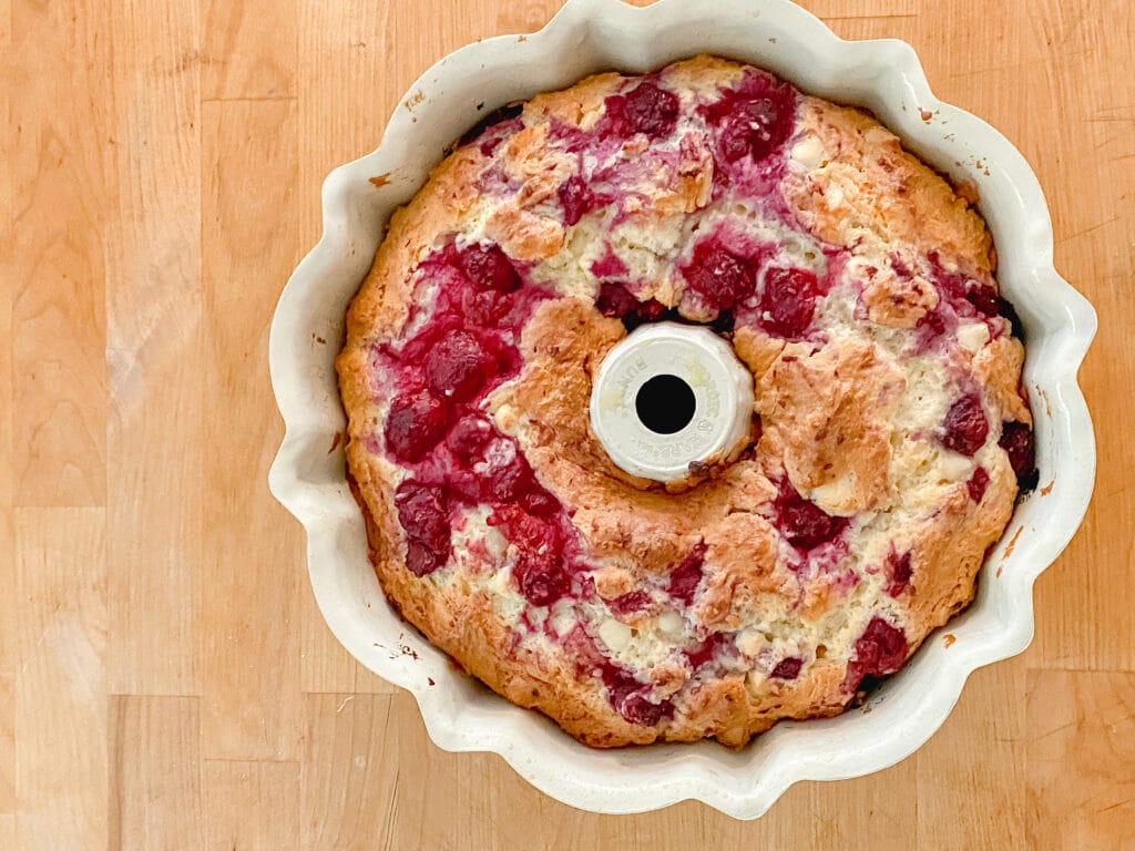 https://funhappyhome.com/wp-content/uploads/2021/09/White-chocolate-raspberry-bundt-cake-fresh-out-of-the-oven-1024x768.jpg