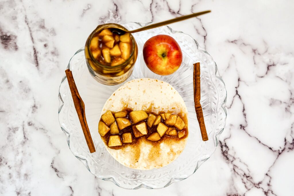 An easy dessert recipe perfect for fall. Wrap apple pie filling in buttery cinnamon sugar coated tortillas.